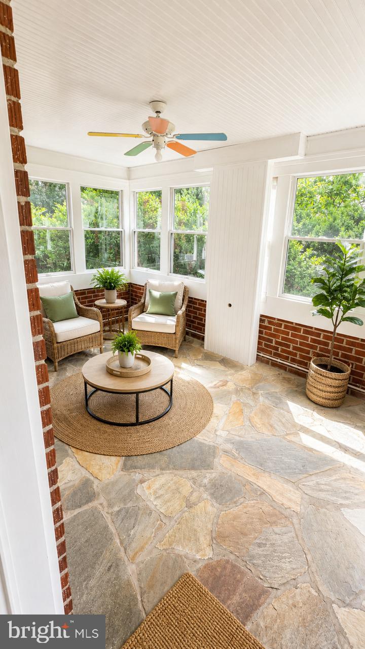 241 Edwards Ferry Road Northeast Leesburg, VA 20176 - Photo 33 of 41 Bright and airy sunroom retreat.