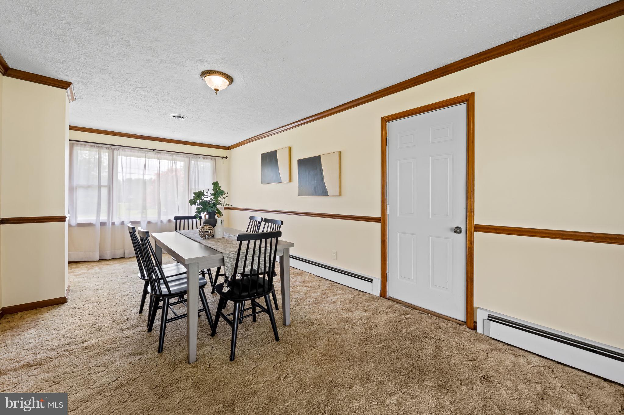 100 Mountain Road Fallston, MD 21047 - Photo 18 of 40 a view of a dining room with furniture and a window