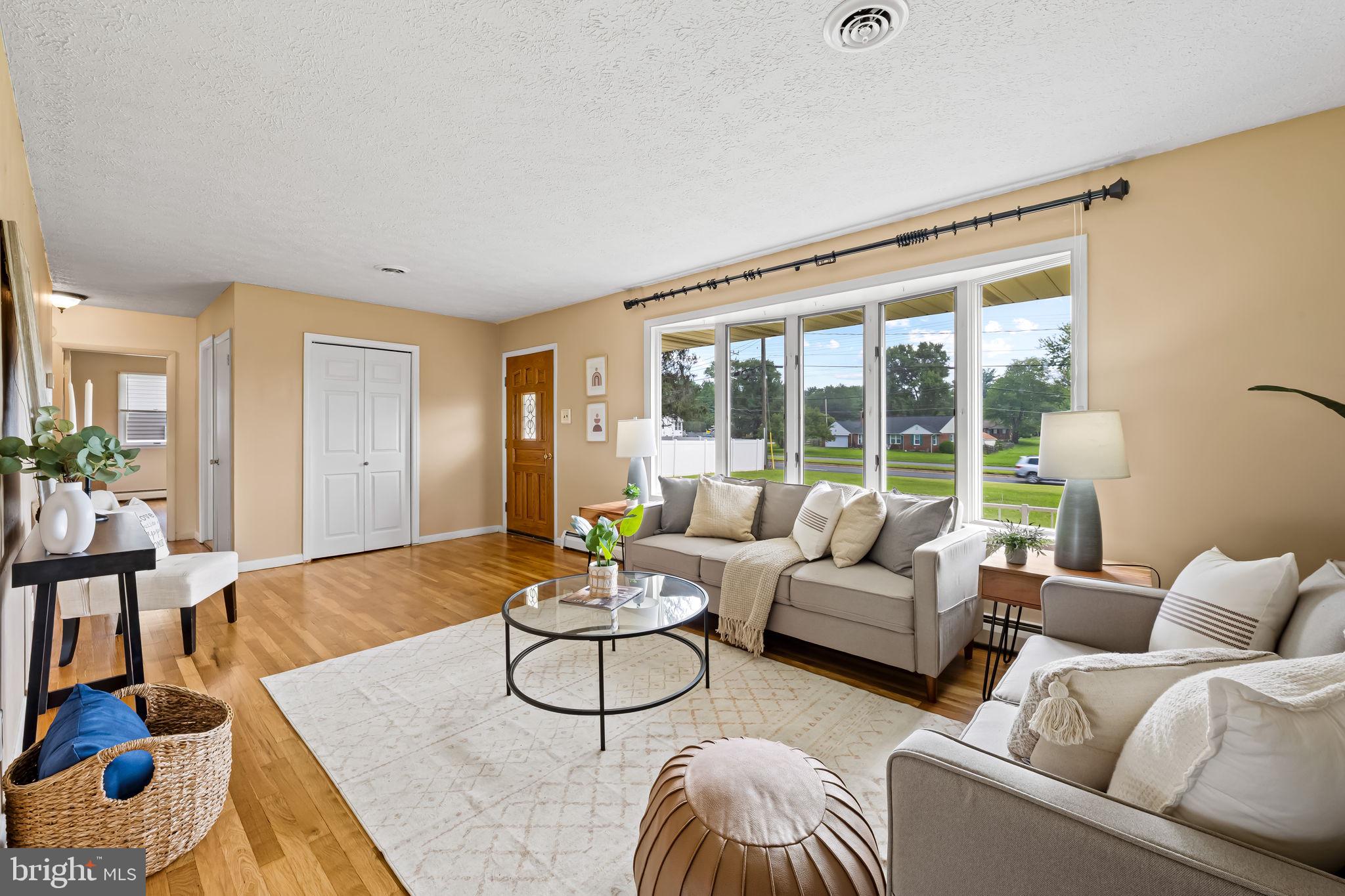 100 Mountain Road Fallston, MD 21047 - Photo 8 of 40 a living room with furniture and a large window