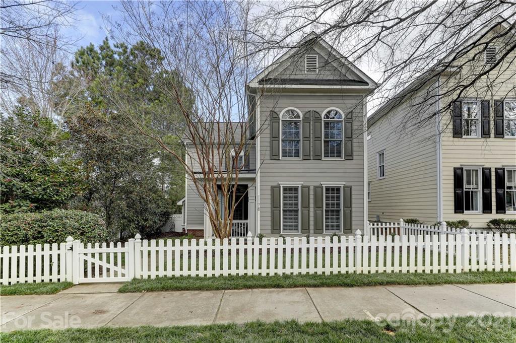 1178 Market Street Fort Mill, SC 29708 - Photo 1 of 47 a front view of a house with a garden