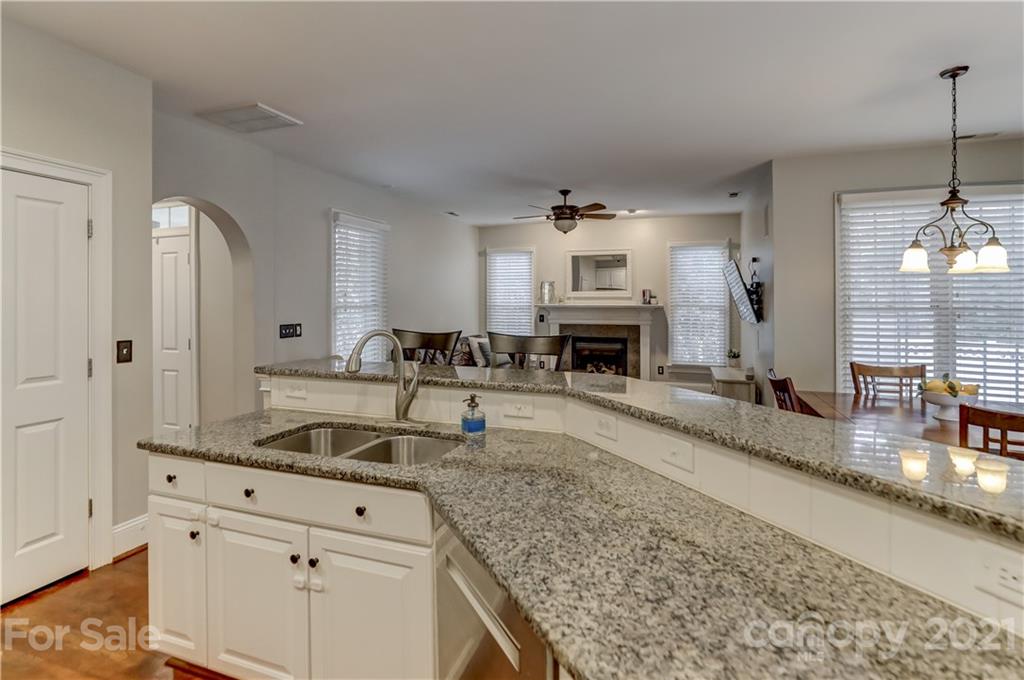 1178 Market Street Fort Mill, SC 29708 - Photo 17 of 47 a kitchen with granite countertop a sink a counter top space and cabinets