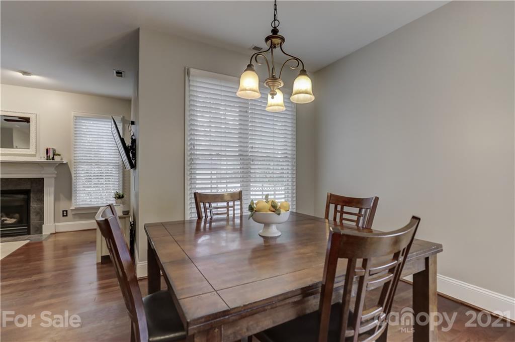 1178 Market Street Fort Mill, SC 29708 - Photo 18 of 47 a view of a dining room with furniture window and wooden floor