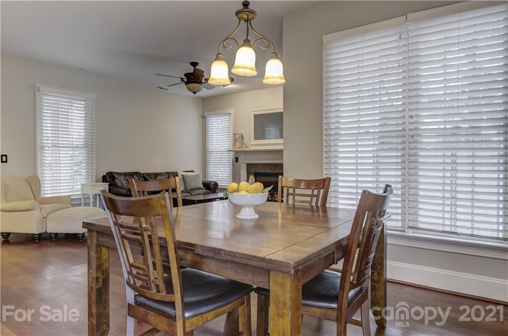 1178 Market Street Fort Mill, SC 29708 - Photo 19 of 47 a view of a dining room with furniture and wooden floor