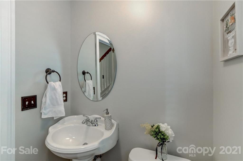 1178 Market Street Fort Mill, SC 29708 - Photo 25 of 47 a bathroom with a toilet sink and mirror