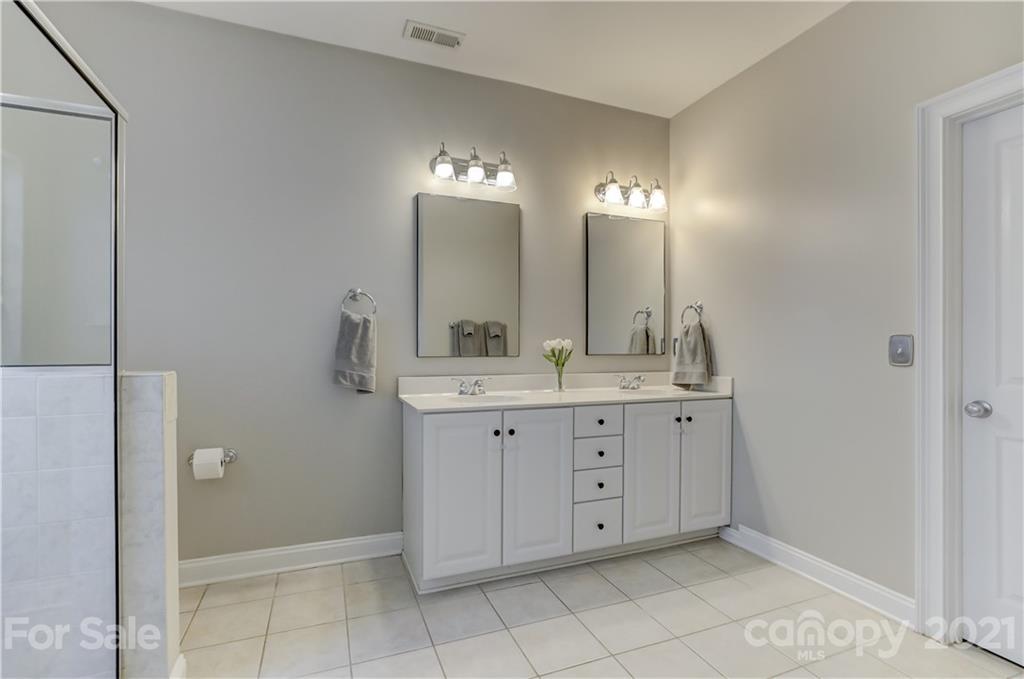 1178 Market Street Fort Mill, SC 29708 - Photo 29 of 47 a bathroom with a double vanity sink and a mirror