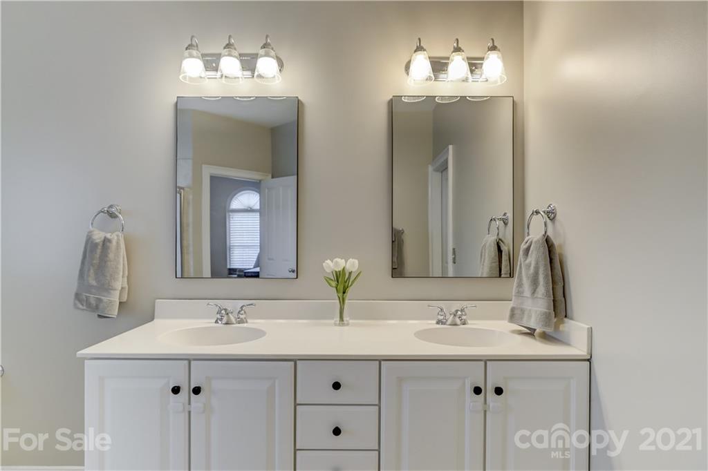 1178 Market Street Fort Mill, SC 29708 - Photo 30 of 47 a bathroom with double vanity sinks and a mirror
