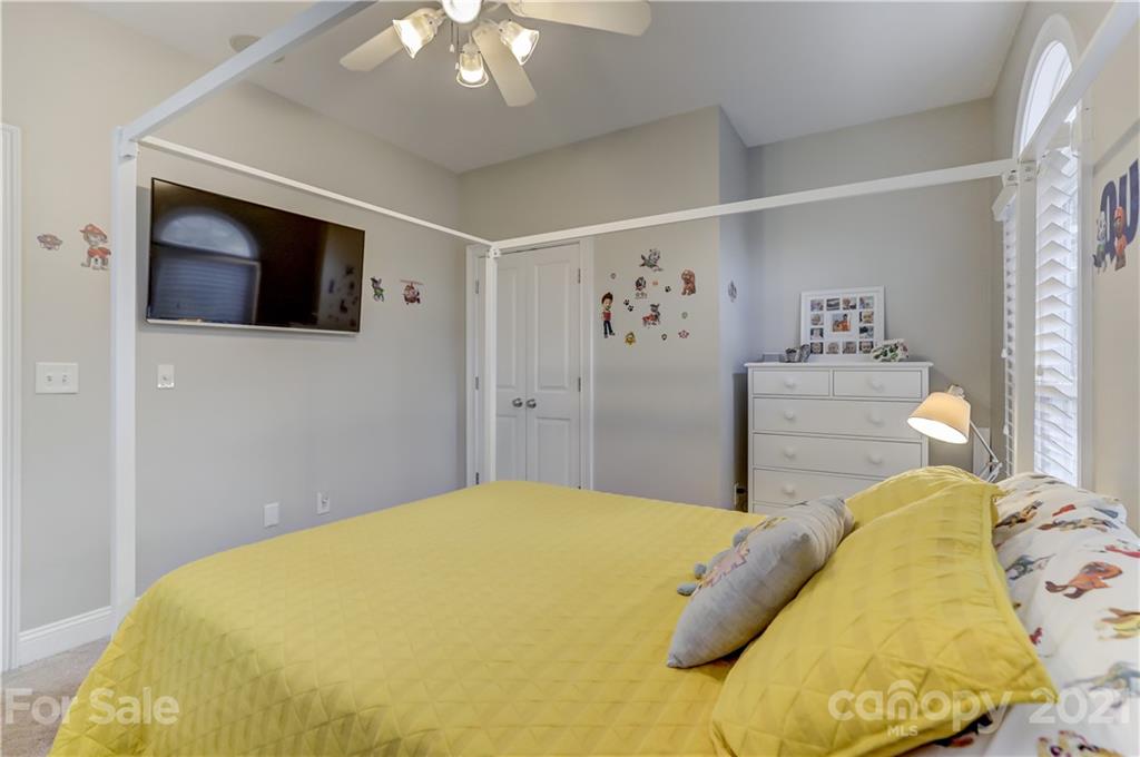 1178 Market Street Fort Mill, SC 29708 - Photo 39 of 47 a bed room with a bed and a television