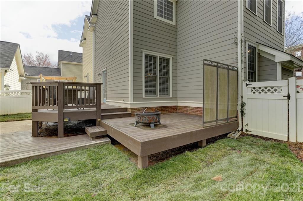 1178 Market Street Fort Mill, SC 29708 - Photo 42 of 47 a backyard of a house with yard fire pit and outdoor seating