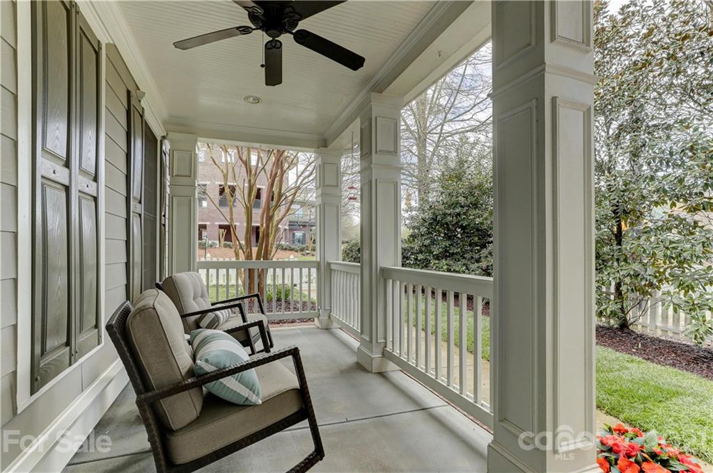 1178 Market Street Fort Mill, SC 29708 - Photo 6 of 47 a view of a porch with furniture and garden