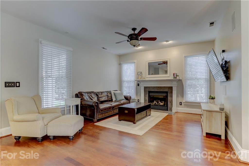 1178 Market Street Fort Mill, SC 29708 - Photo 10 of 47 a living room with furniture and a fireplace