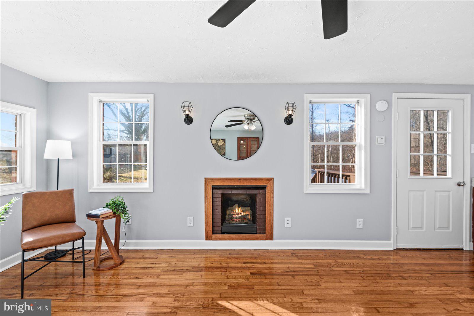 27 Truslow Road Fredericksburg, VA 22405 - Photo 17 of 35 a living room with furniture and a fireplace