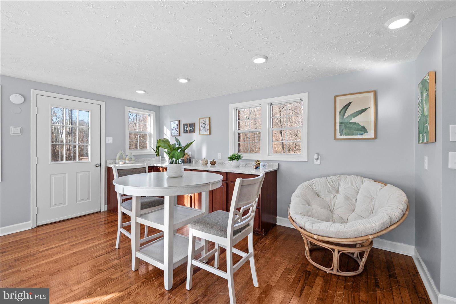 27 Truslow Road Fredericksburg, VA 22405 - Photo 18 of 35 a view of a dining room with furniture window and wooden floor