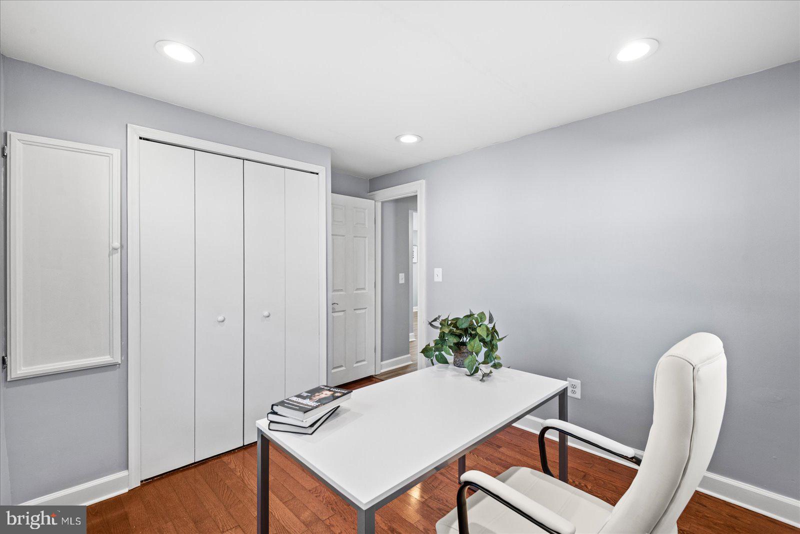 27 Truslow Road Fredericksburg, VA 22405 - Photo 23 of 35 a workspace with furniture and wooden floor