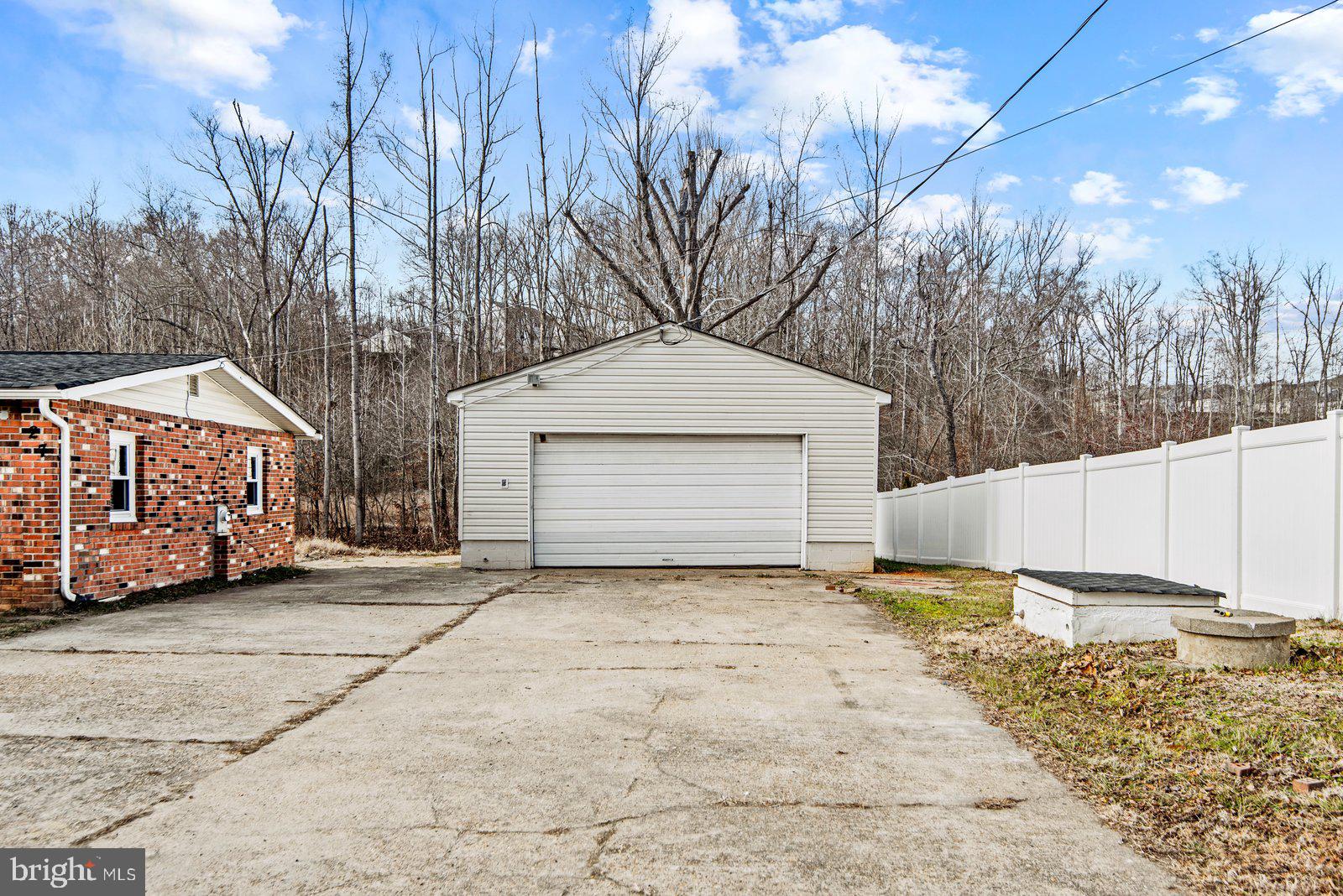 27 Truslow Road Fredericksburg, VA 22405 - Photo 31 of 35 a view of a house with a yard covered in snow