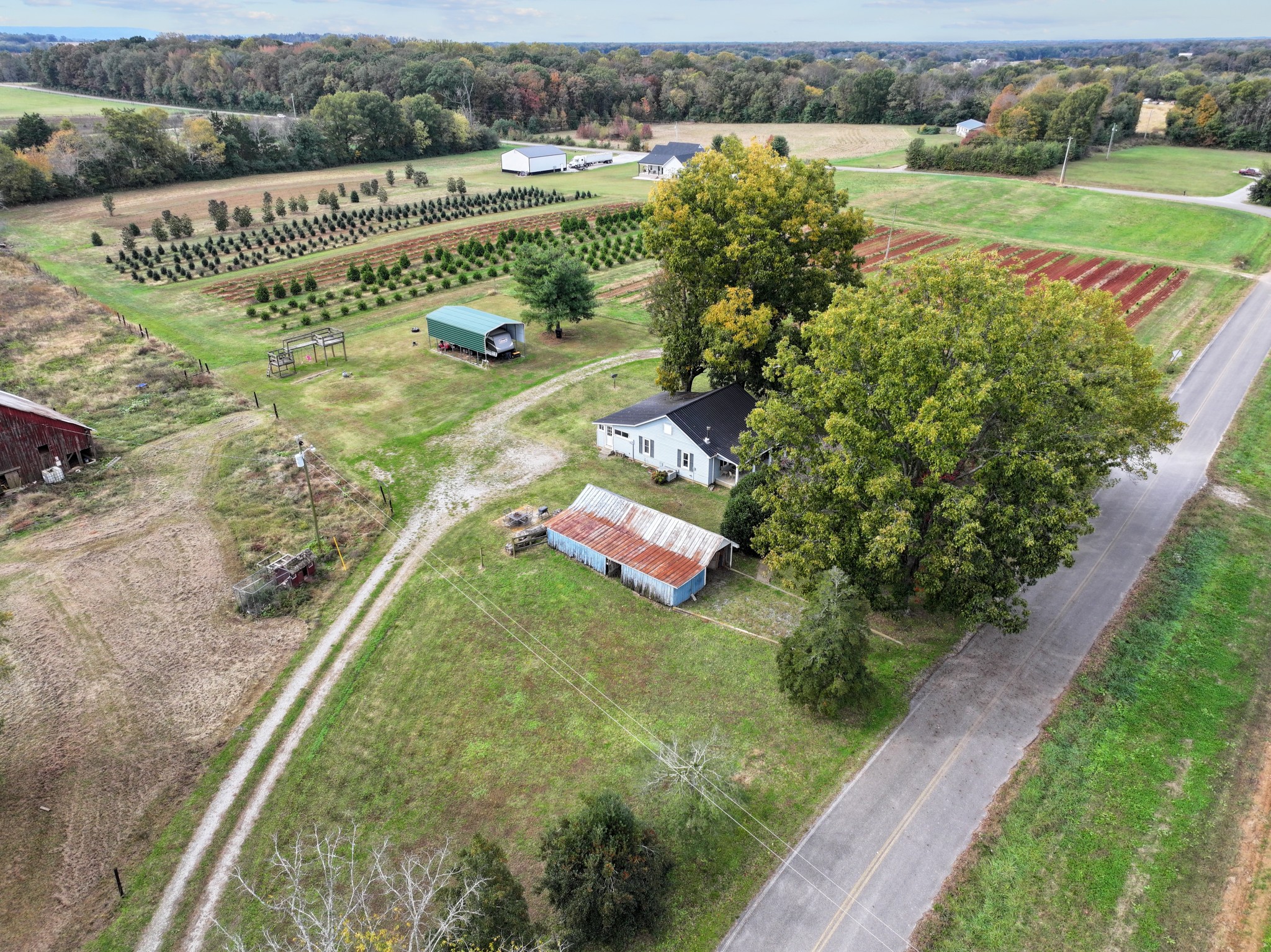 709 Isbell Turn Road Winchester, TN 37398 - Photo 20 of 22 a view of a garden with a lake