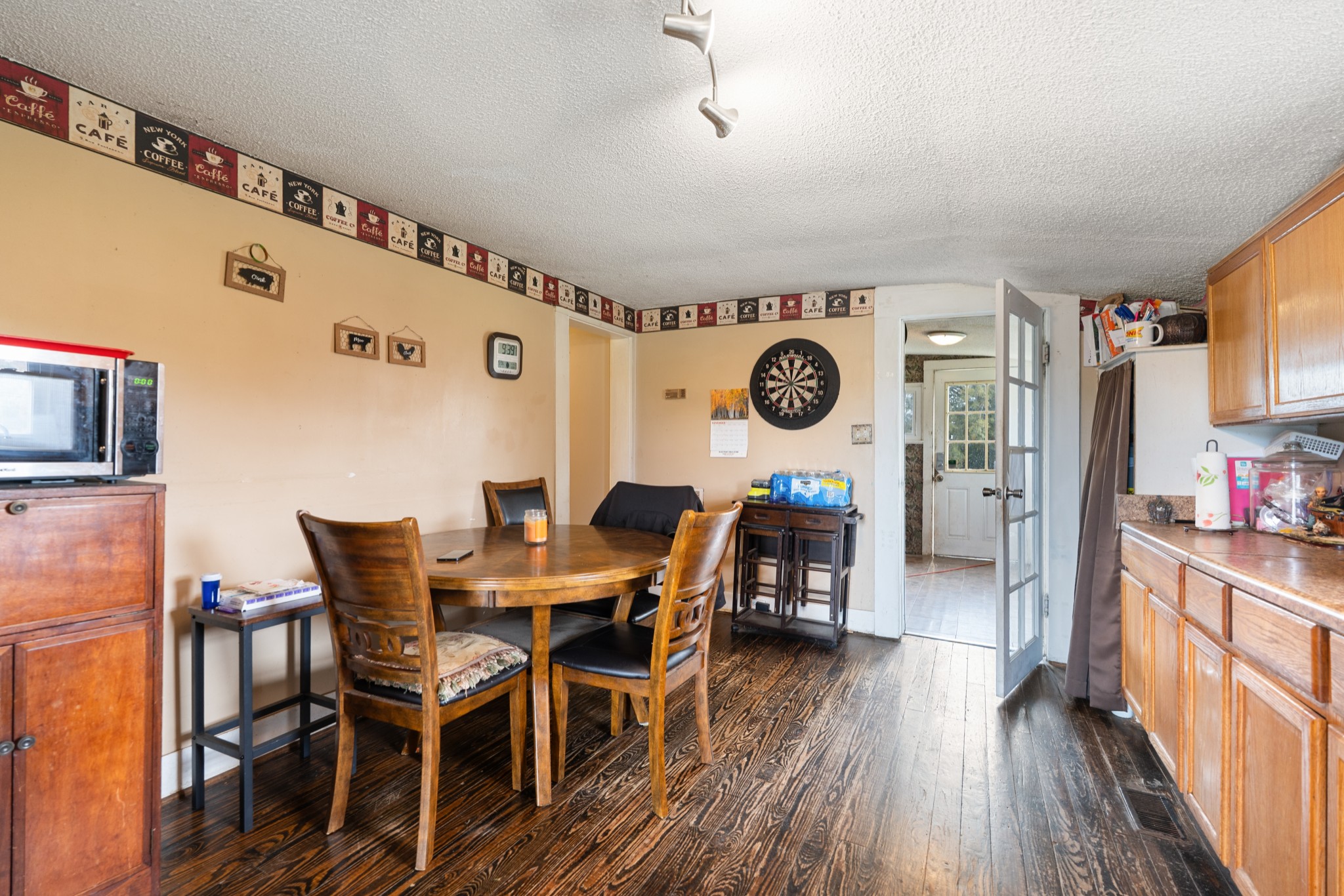 709 Isbell Turn Road Winchester, TN 37398 - Photo 7 of 22 a view of a dining room with furniture and wooden floor