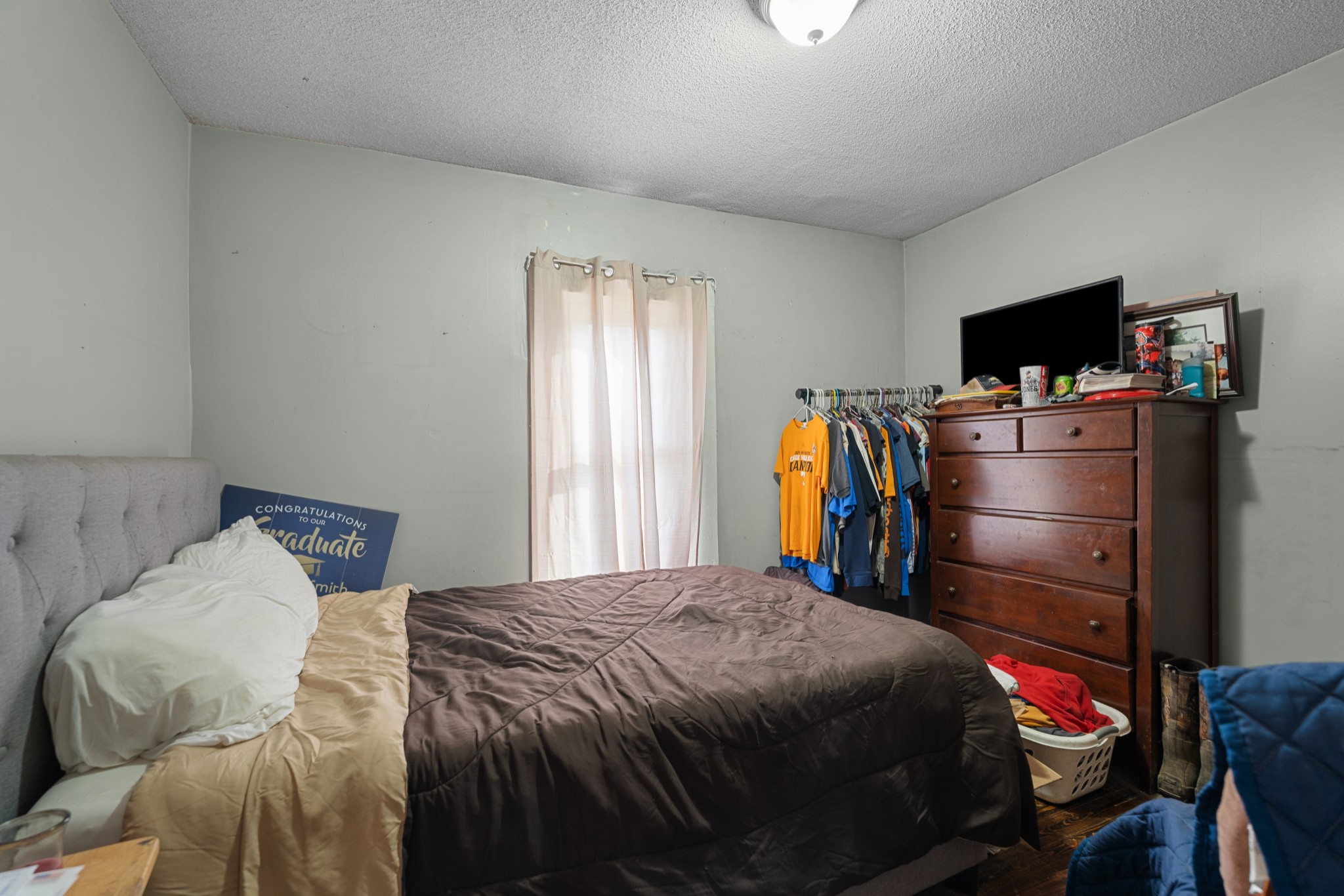 709 Isbell Turn Road Winchester, TN 37398 - Photo 9 of 22 a bedroom with a bed and a flat screen tv