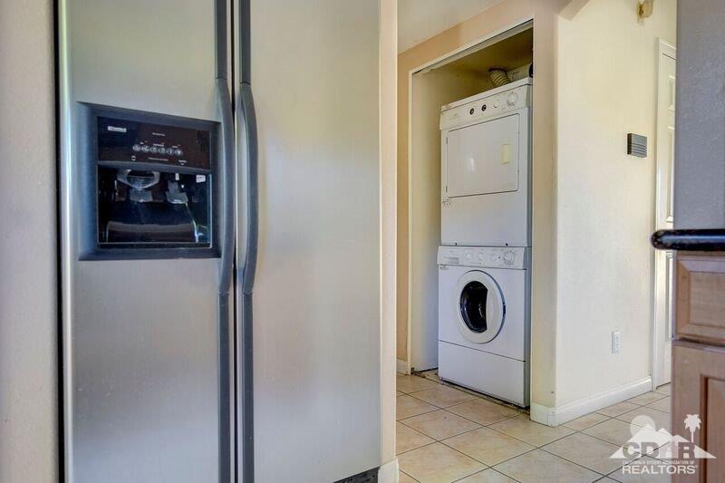 34404 Laura Way Rancho Mirage, CA 92270 - Photo 15 of 31 a utility room with dryer and washer