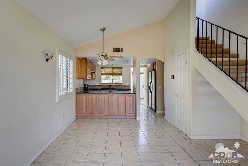 34404 Laura Way Rancho Mirage, CA 92270 - Photo 4 of 31 a view of a kitchen from the hallway