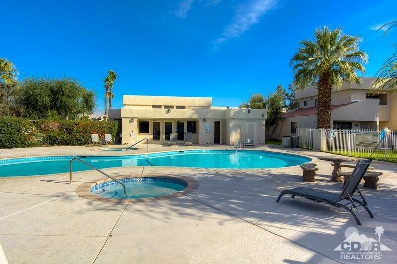 34404 Laura Way Rancho Mirage, CA 92270 - Photo 31 of 31 a view of a house with backyard porch and sitting area