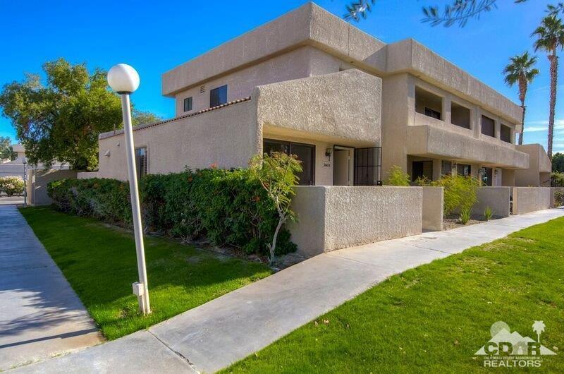 34404 Laura Way Rancho Mirage, CA 92270 - Photo 6 of 31 a front view of house with yard and green space