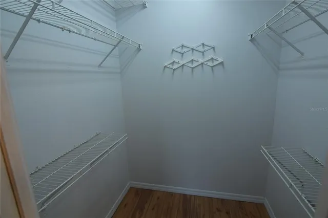 a view of small space with racks on the wall