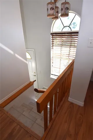 a view of entryway with wooden floor