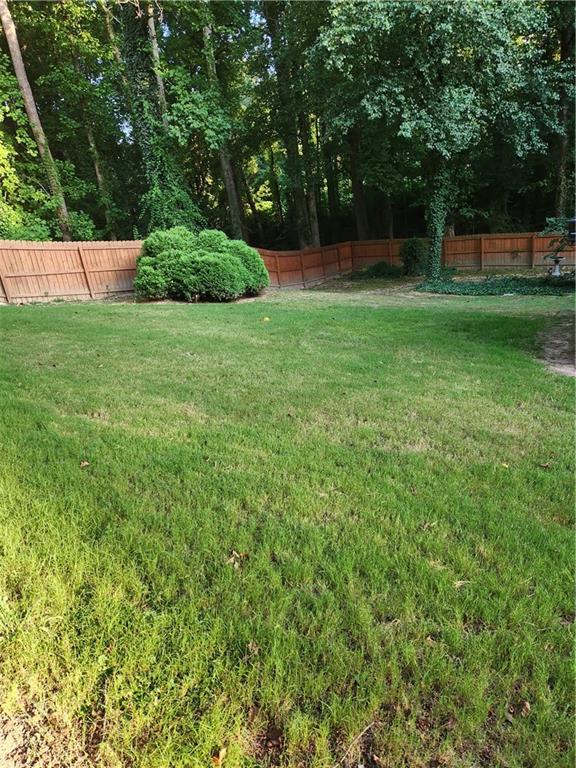 2520 Cobble Creek Lane Grayson, GA 30017 - Photo 44 of 114 a view of a backyard with a large trees