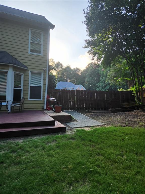 2520 Cobble Creek Lane Grayson, GA 30017 - Photo 47 of 114 a view of a house with backyard and sitting area
