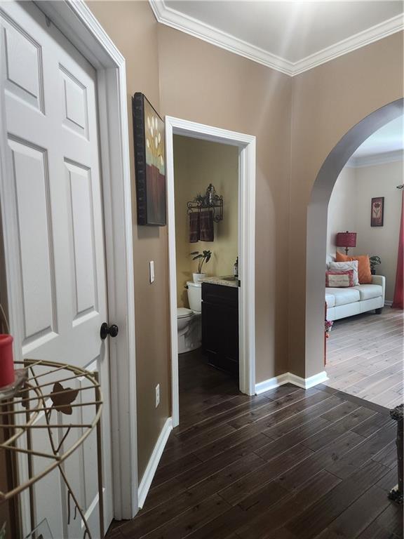 2520 Cobble Creek Lane Grayson, GA 30017 - Photo 51 of 114 a view of a hallway to a livingroom and a hallway with wooden floor