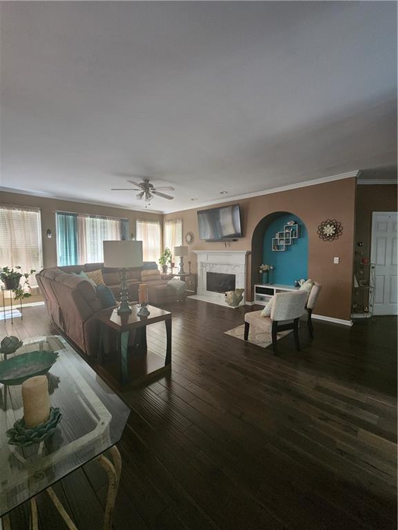 2520 Cobble Creek Lane Grayson, GA 30017 - Photo 57 of 114 a living room with couches and a dining table with wooden floor