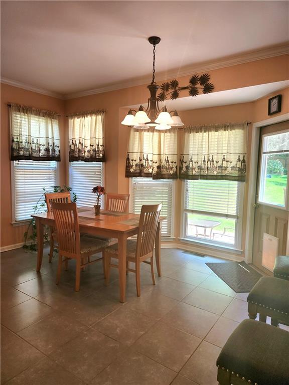 2520 Cobble Creek Lane Grayson, GA 30017 - Photo 58 of 114 a dining room with furniture and window