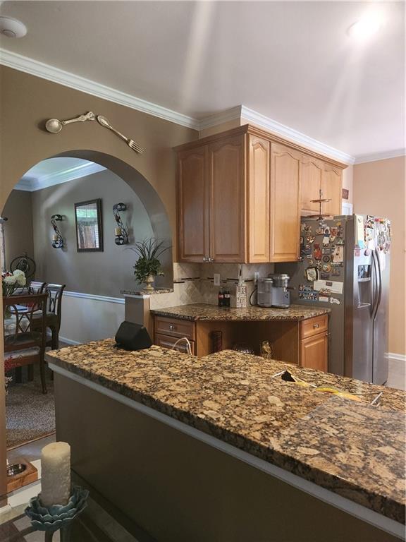 2520 Cobble Creek Lane Grayson, GA 30017 - Photo 66 of 114 a kitchen with kitchen island granite countertop a sink stove and refrigerator