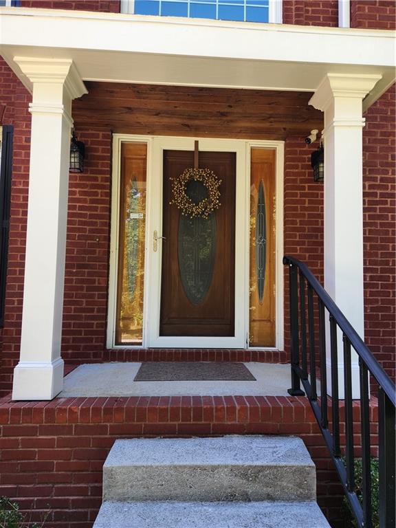 2520 Cobble Creek Lane Grayson, GA 30017 - Photo 8 of 114 a view of a entryway door of the house