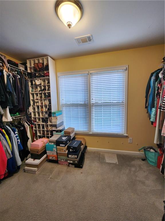 2520 Cobble Creek Lane Grayson, GA 30017 - Photo 85 of 114 a livingroom with furniture and a floor to ceiling window