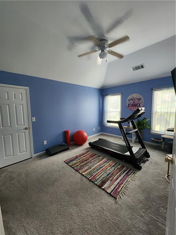 2520 Cobble Creek Lane Grayson, GA 30017 - Photo 97 of 114 a room with gym equipment and a rug