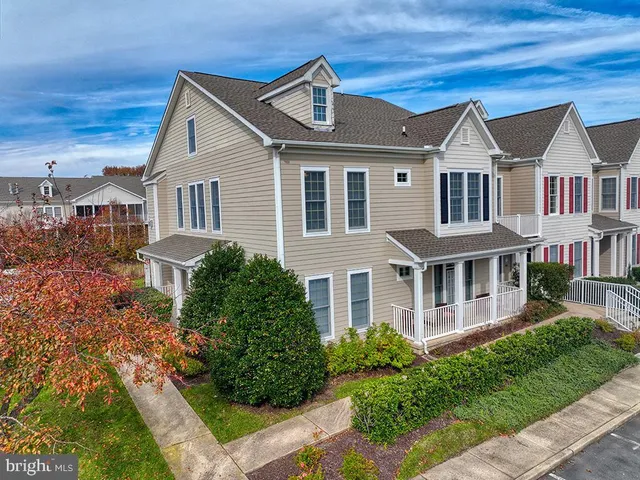 a view of path along with retail shop and buildings