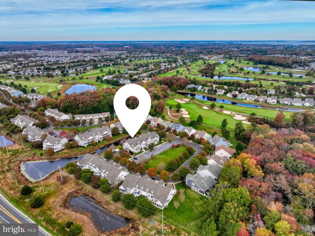 a view of path along with retail shop and buildings