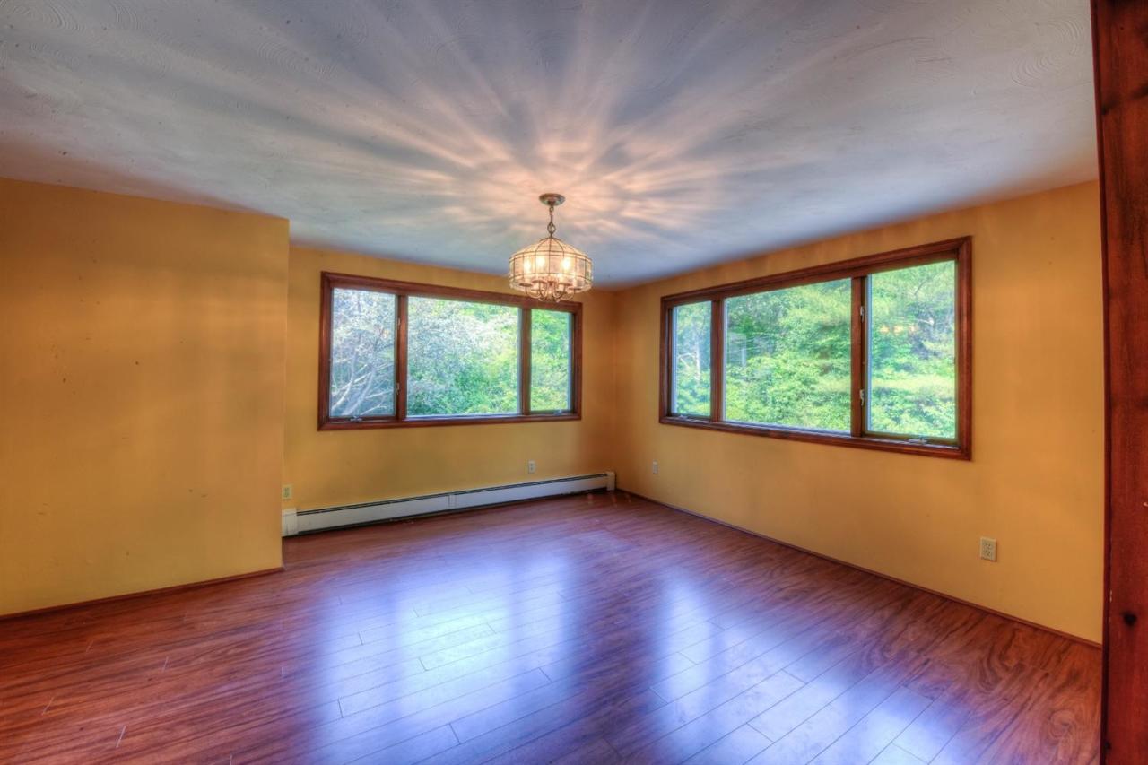 1640 Old Stage Road West Barnstable, MA 02668 - Photo 11 of 35 a view of room with window and hardwood floor