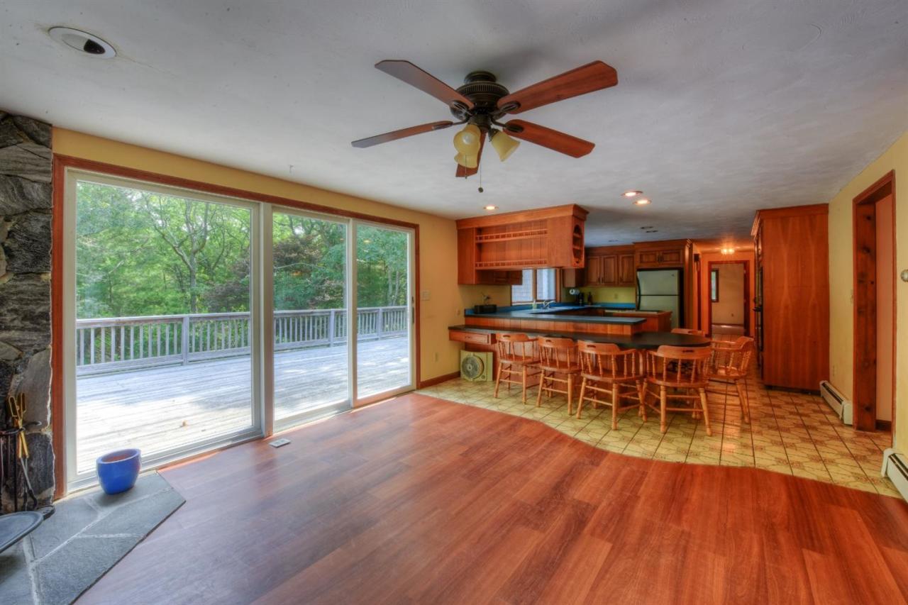 1640 Old Stage Road West Barnstable, MA 02668 - Photo 14 of 35 a dining room with furniture and a large window