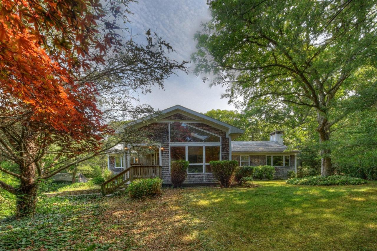 1640 Old Stage Road West Barnstable, MA 02668 - Photo 2 of 35 a front view of a house with a garden