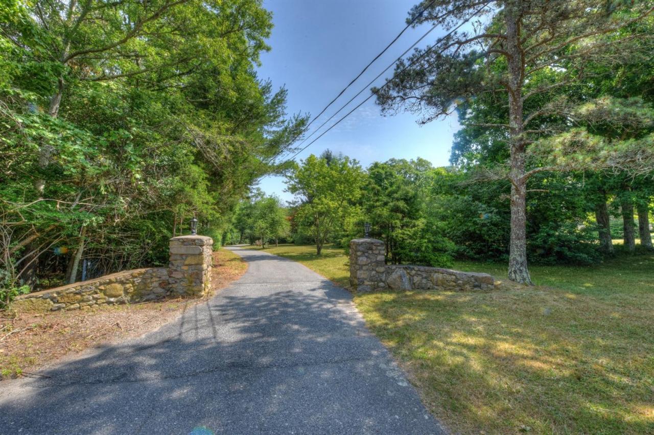 1640 Old Stage Road West Barnstable, MA 02668 - Photo 27 of 35 a view of a water fountain with large trees