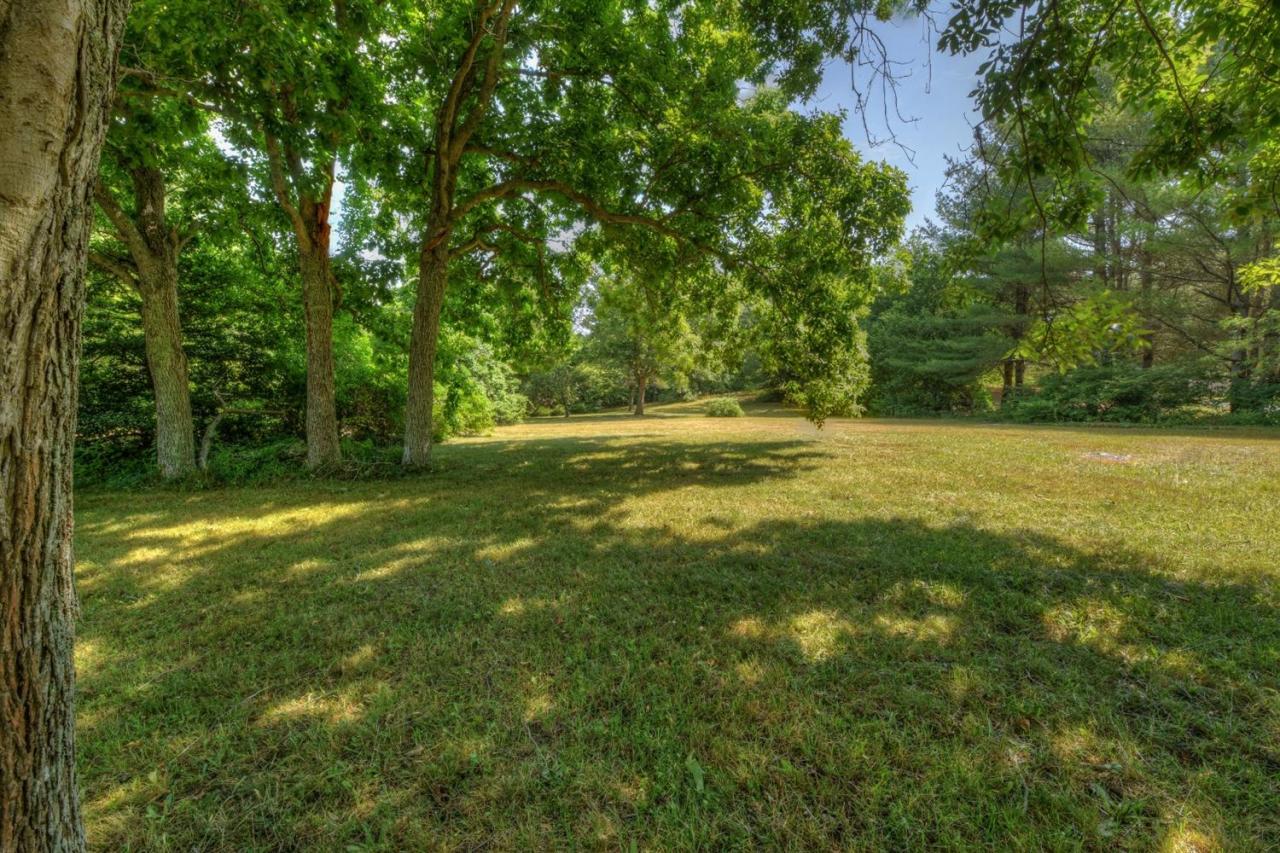 1640 Old Stage Road West Barnstable, MA 02668 - Photo 33 of 35 a view of a field with a trees in the background