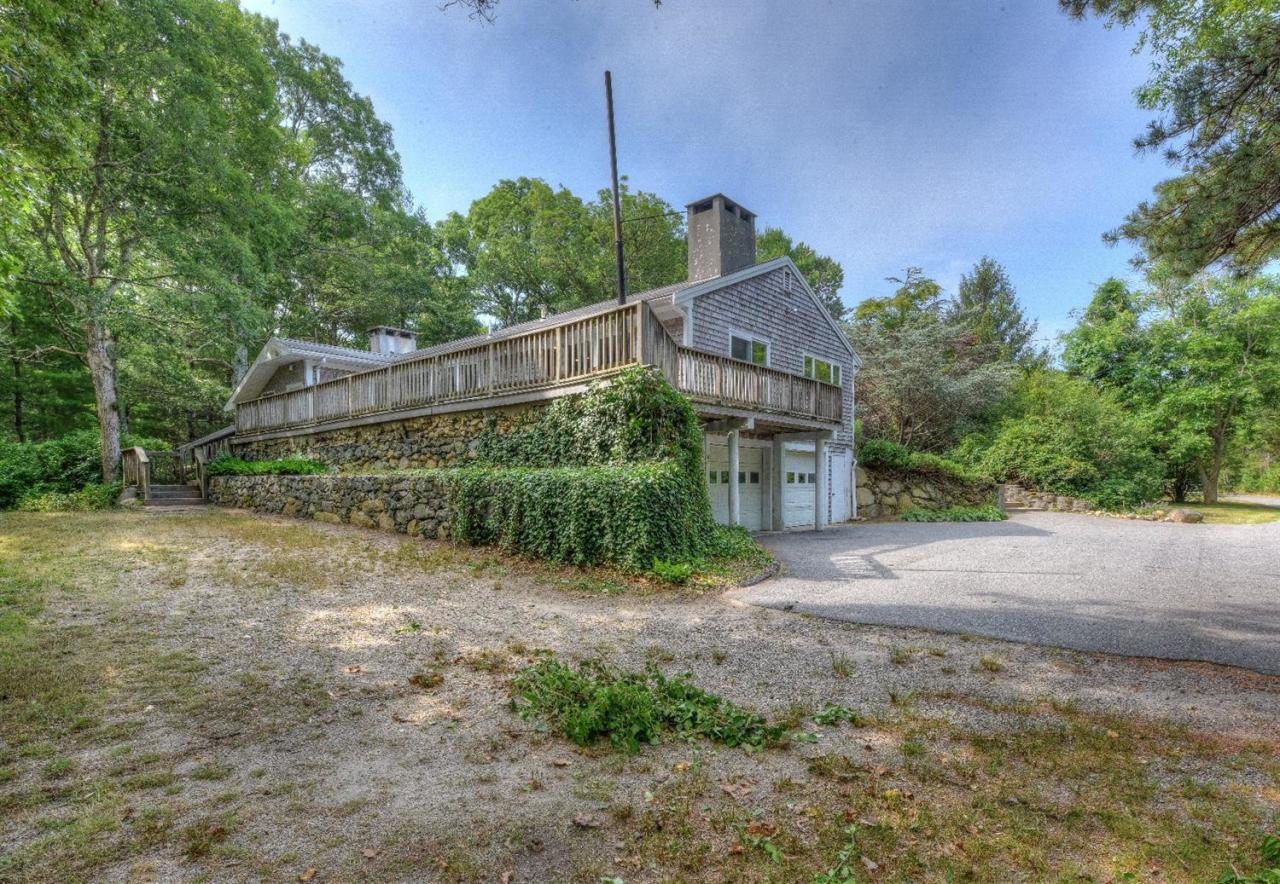1640 Old Stage Road West Barnstable, MA 02668 - Photo 4 of 35 a view of a house with a street