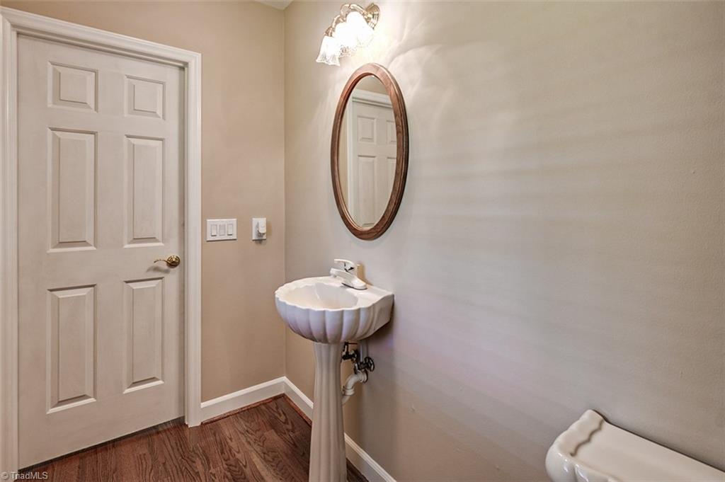 9015 Racine Road Pleasant Garden, NC 27313 - Photo 12 of 30 Guest bath, hardwood floors