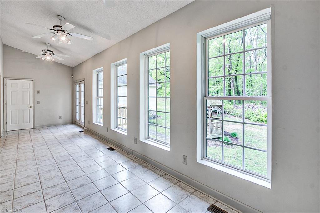 9015 Racine Road Pleasant Garden, NC 27313 - Photo 15 of 30 Sunroom, ceramic tile floor