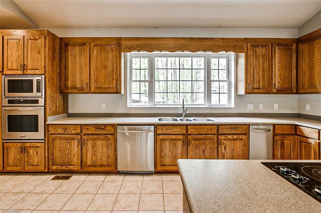 9015 Racine Road Pleasant Garden, NC 27313 - Photo 9 of 30 Kitchen, tile floors