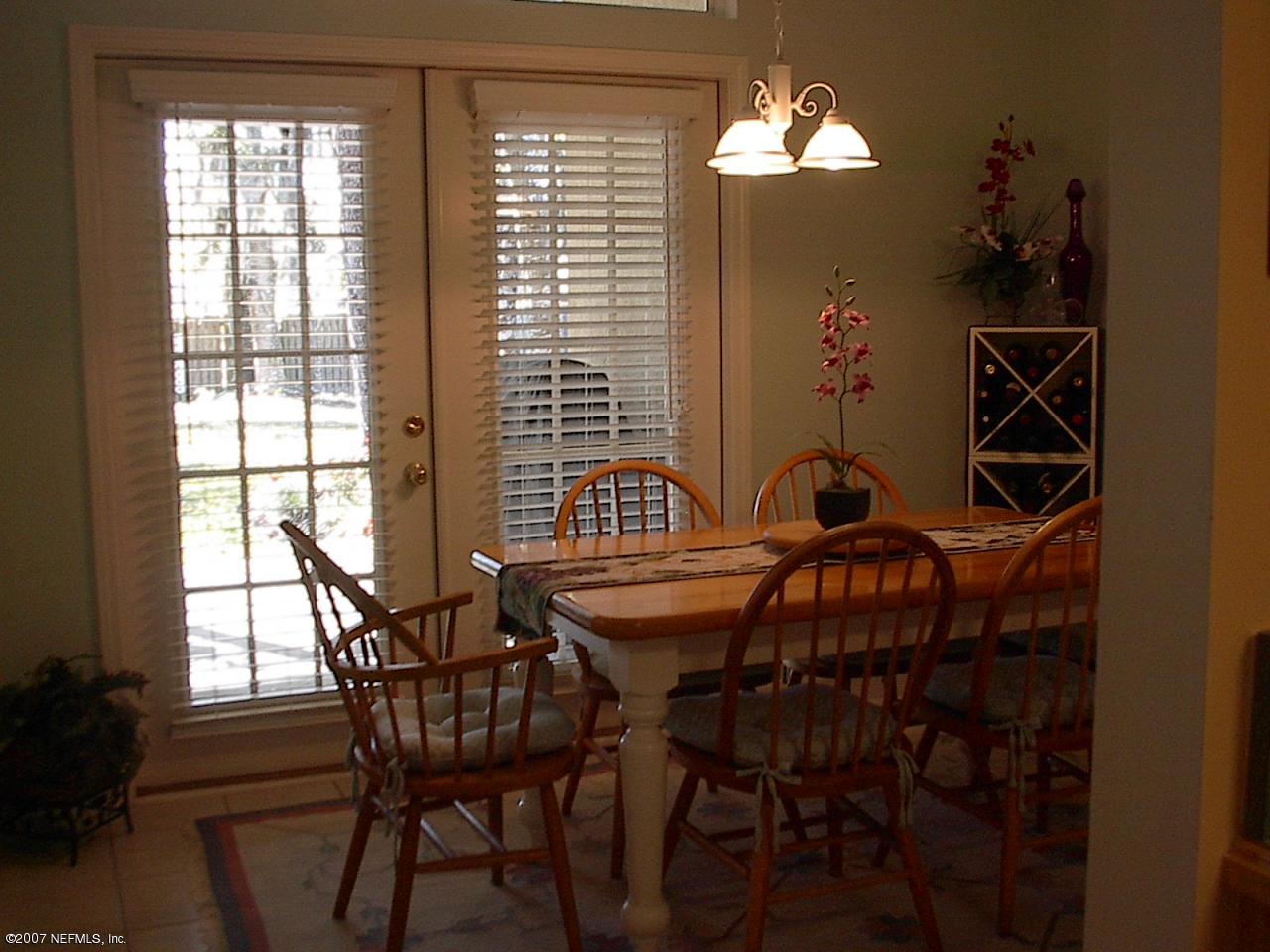 11382 Mandarin Ridge Lane Jacksonville, FL 32258 - Photo 14 of 23 a dining room with furniture and window