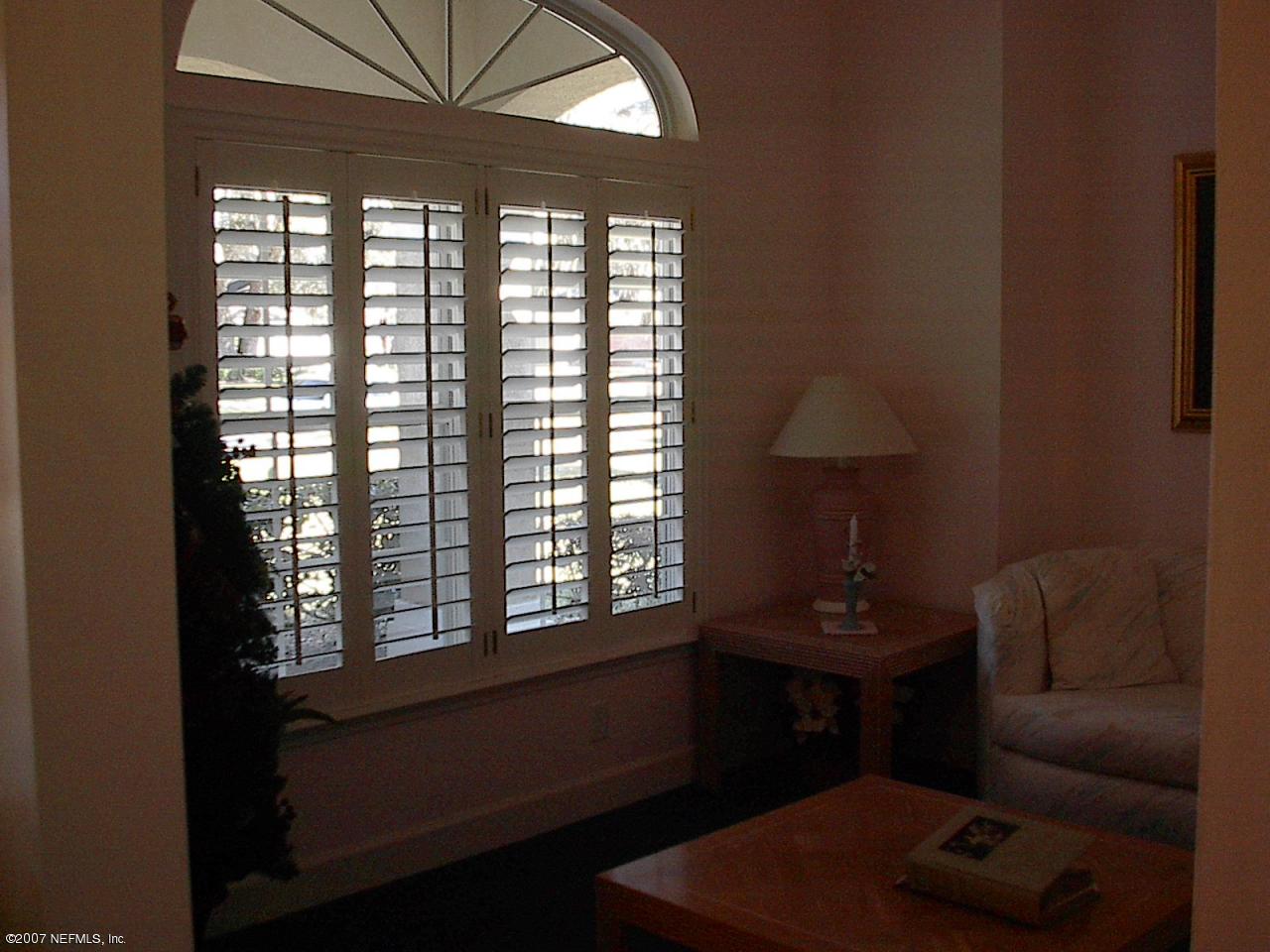 11382 Mandarin Ridge Lane Jacksonville, FL 32258 - Photo 4 of 23 a living room with furniture and a window