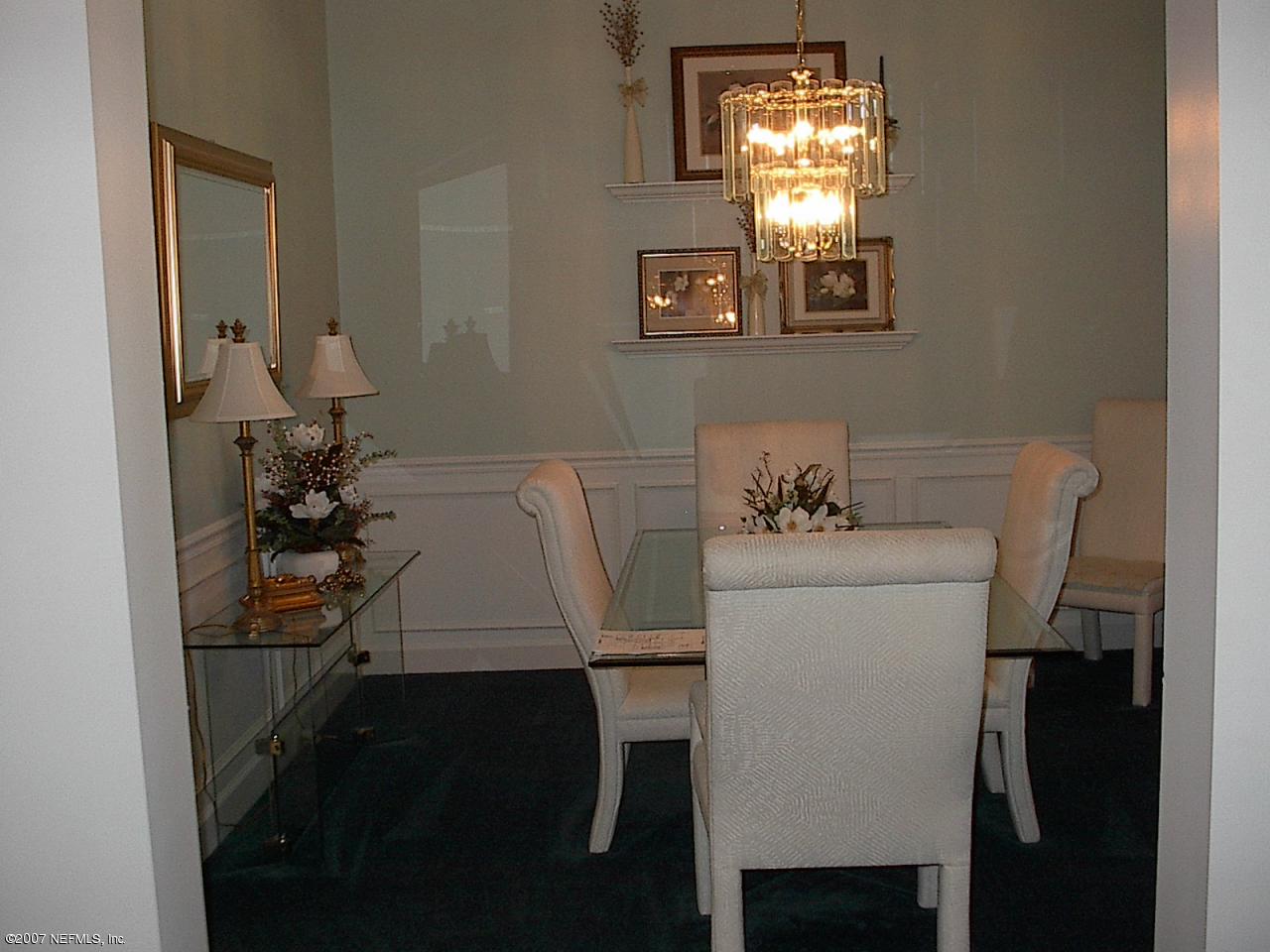 11382 Mandarin Ridge Lane Jacksonville, FL 32258 - Photo 5 of 23 a bathroom with a sink and a mirror